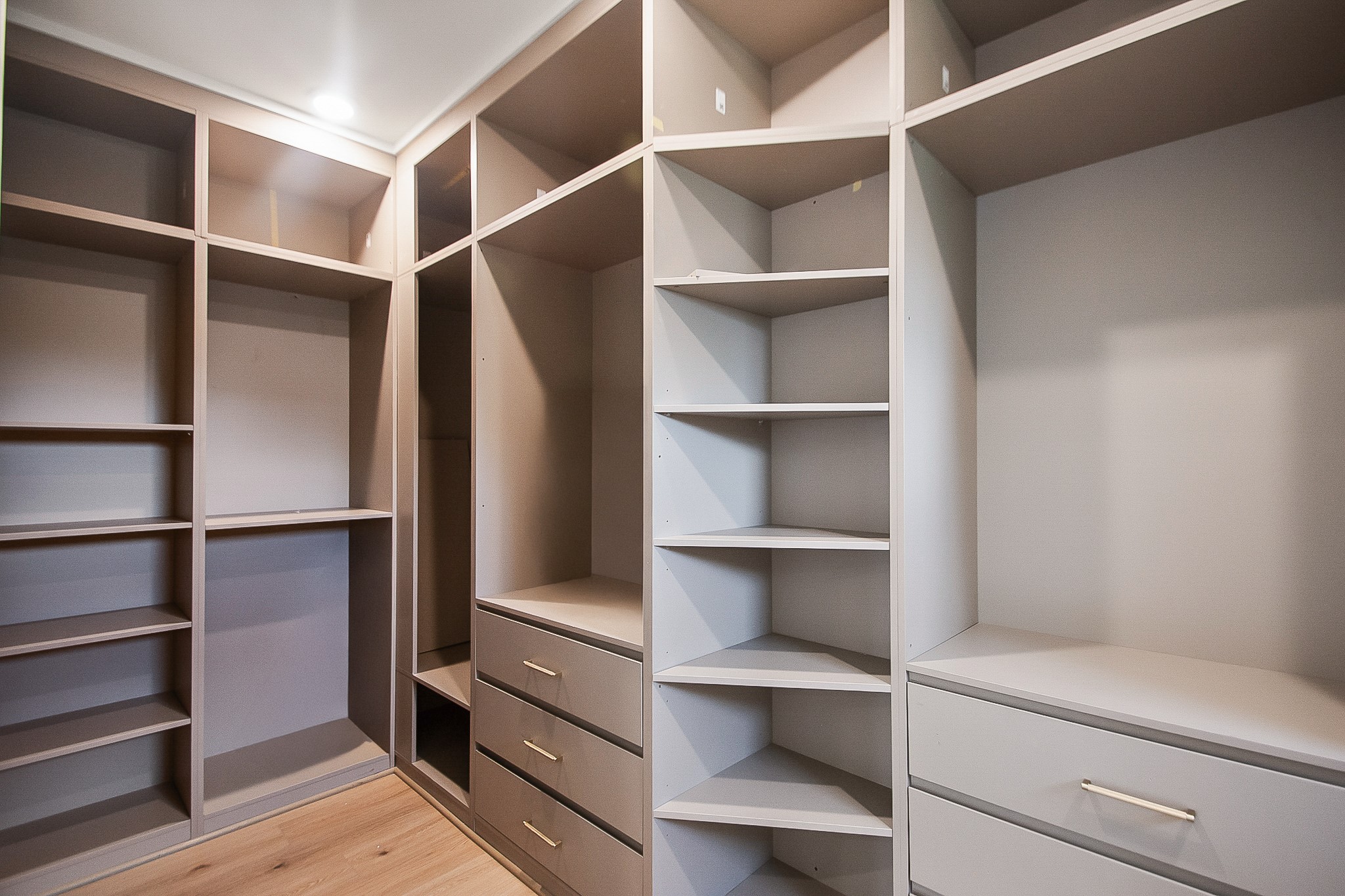1109 Tabor Street Houston, TX 77009 - Photo 23 of 38 a view of walk in closet with empty racks