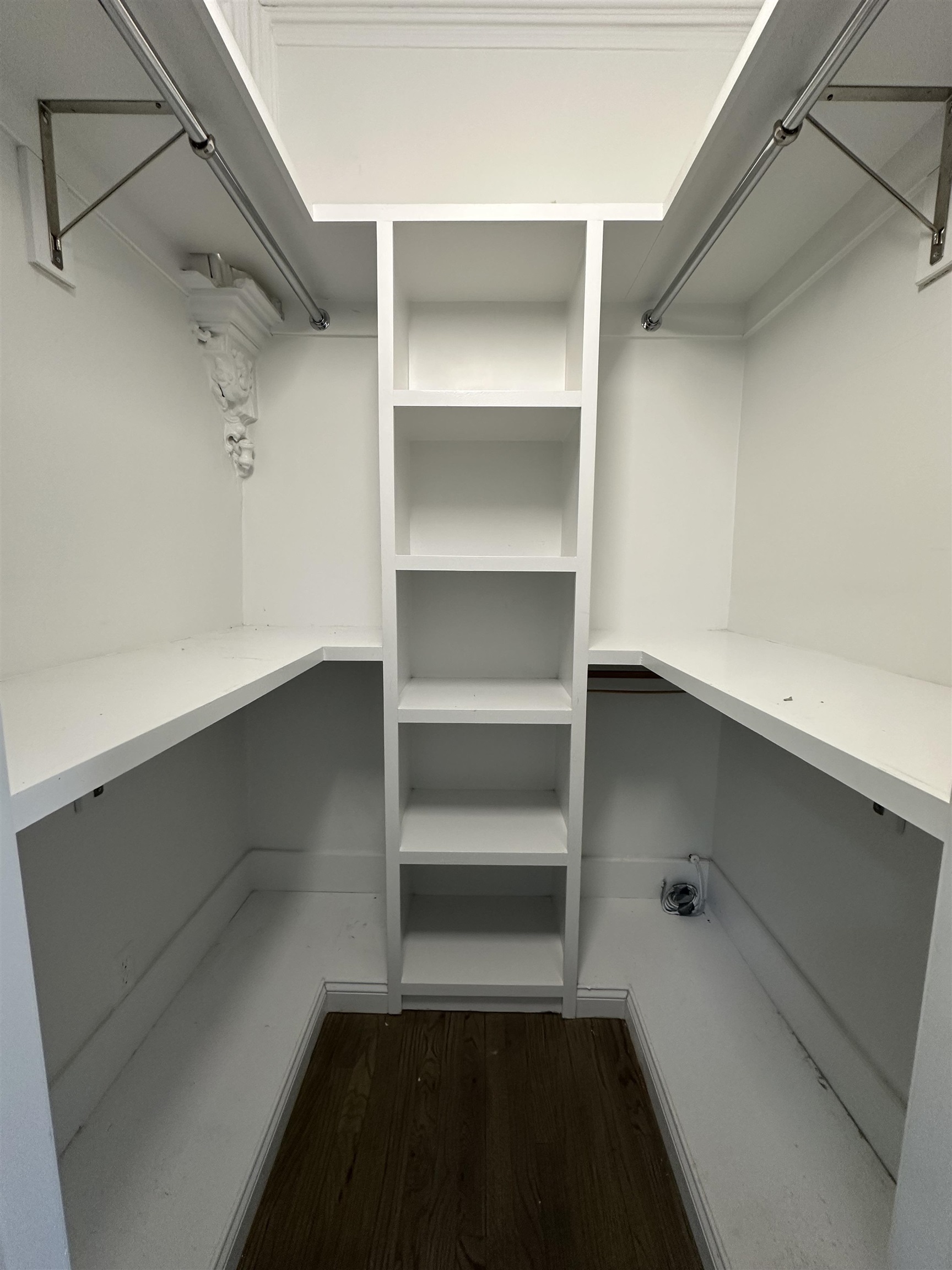 297 4th Street, Unit 2 Jersey City, NJ 07302 - Photo 18 of 19 a storage room with empty racks