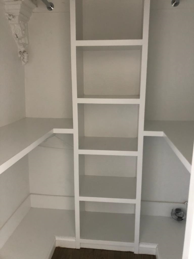 297 4th Street, Unit 2 Jersey City, NJ 07302 - Photo 7 of 19 a view of walk in closet with empty racks