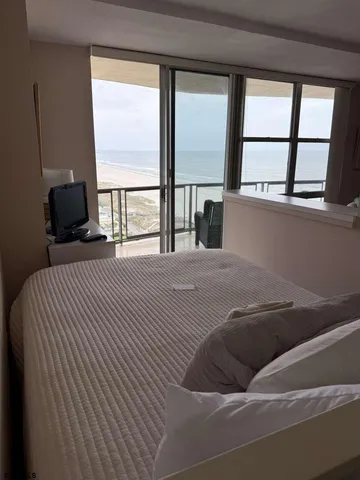 a kitchen with a sink cabinets and appliances