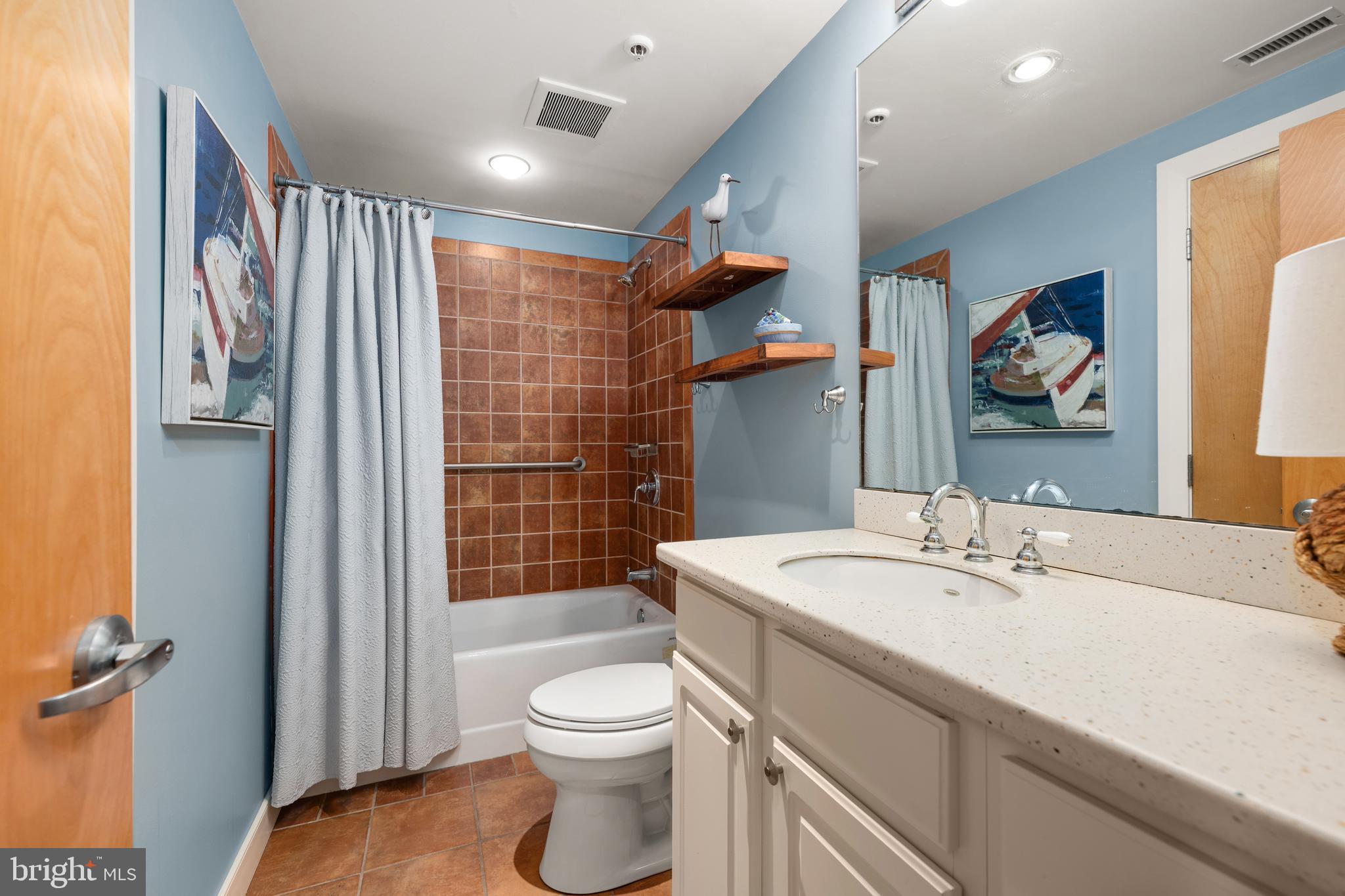 110 Anglers Road, Unit 206 Lewes, DE 19958 - Photo 27 of 40 a spacious bathroom with a sink a toilet and shower