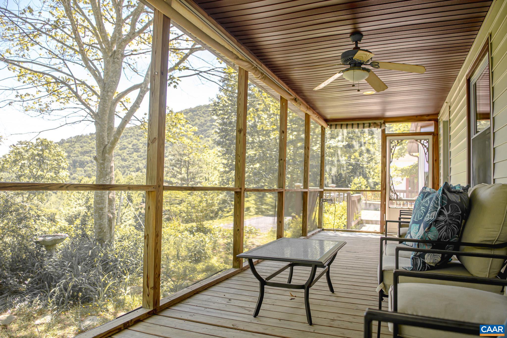 3033 Bacon Hollow Road Dyke, VA 22935 - Photo 12 of 66 a view of a room with furniture and wooden floor