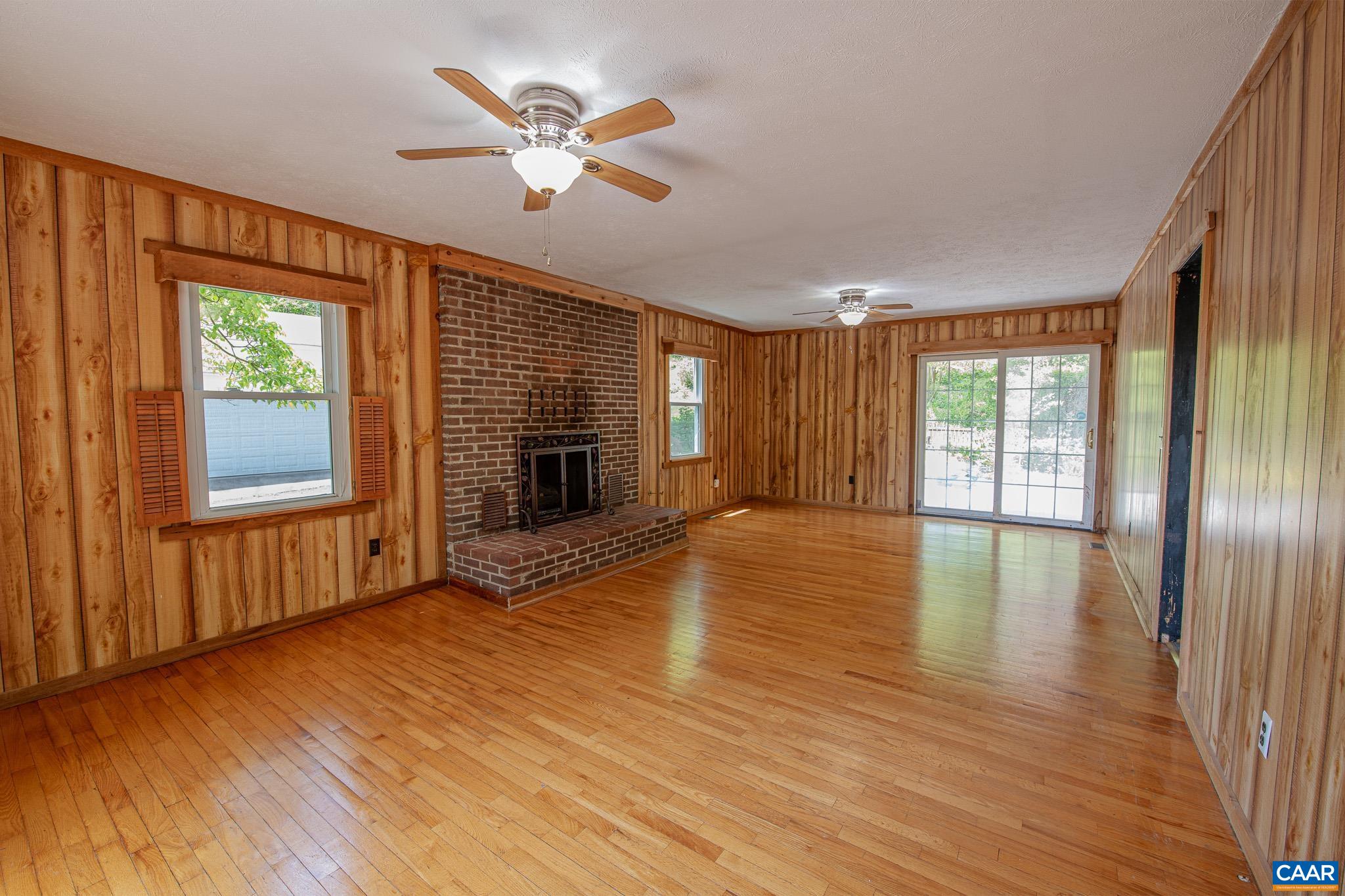 3033 Bacon Hollow Road Dyke, VA 22935 - Photo 13 of 66 a view of an empty room with a window and wooden floor