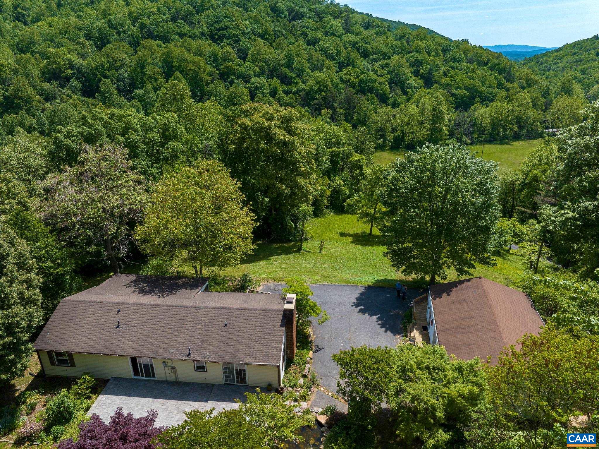 3033 Bacon Hollow Road Dyke, VA 22935 - Photo 2 of 66 an aerial view of a house with yard and outdoor seating