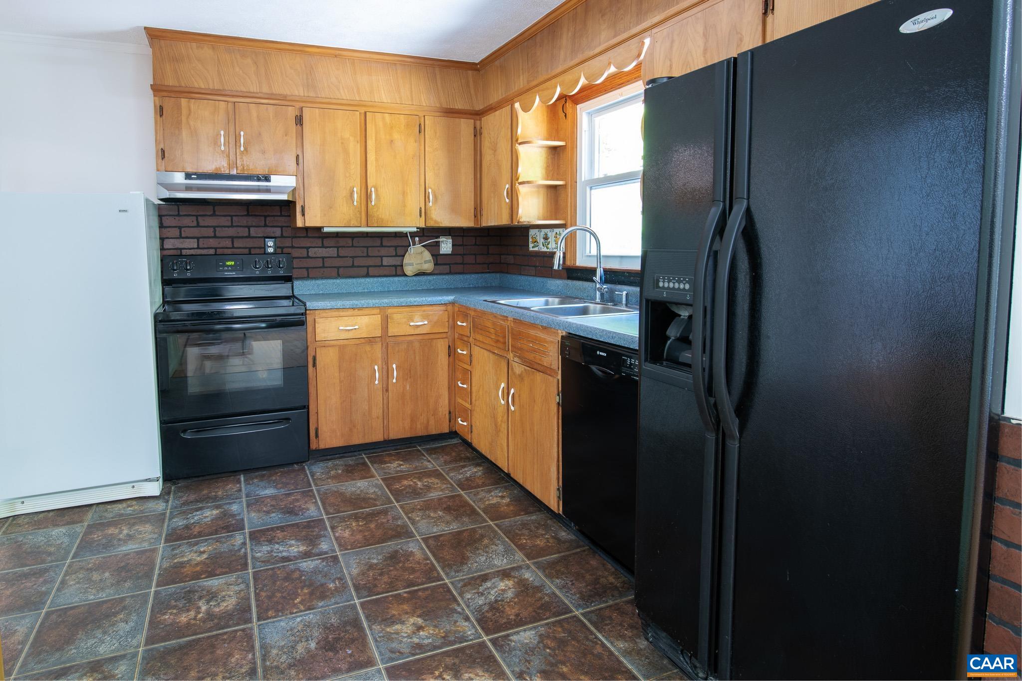 3033 Bacon Hollow Road Dyke, VA 22935 - Photo 21 of 66 a kitchen with stainless steel appliances granite countertop a refrigerator and a stove
