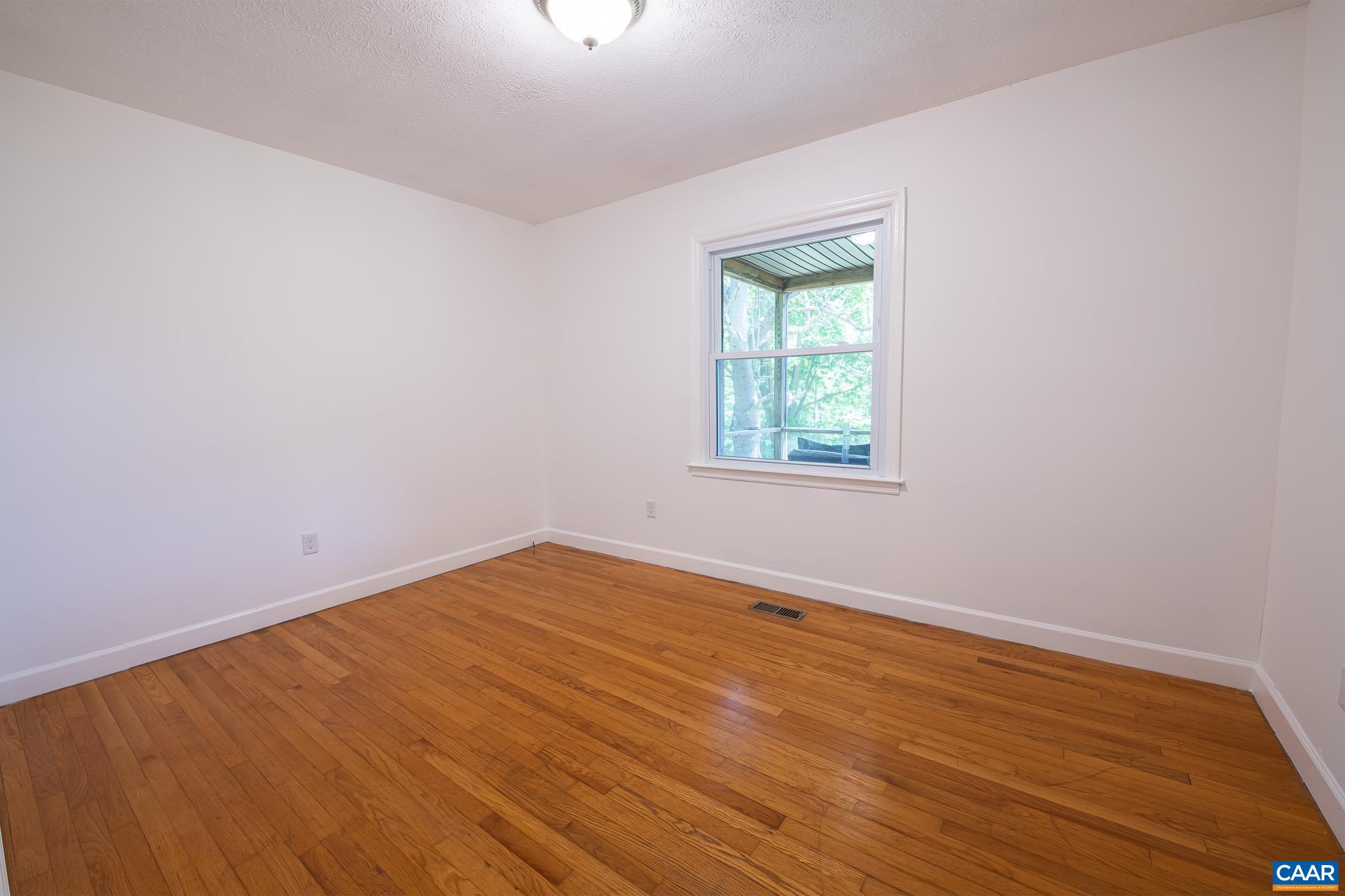 3033 Bacon Hollow Road Dyke, VA 22935 - Photo 24 of 66 an empty room with a window