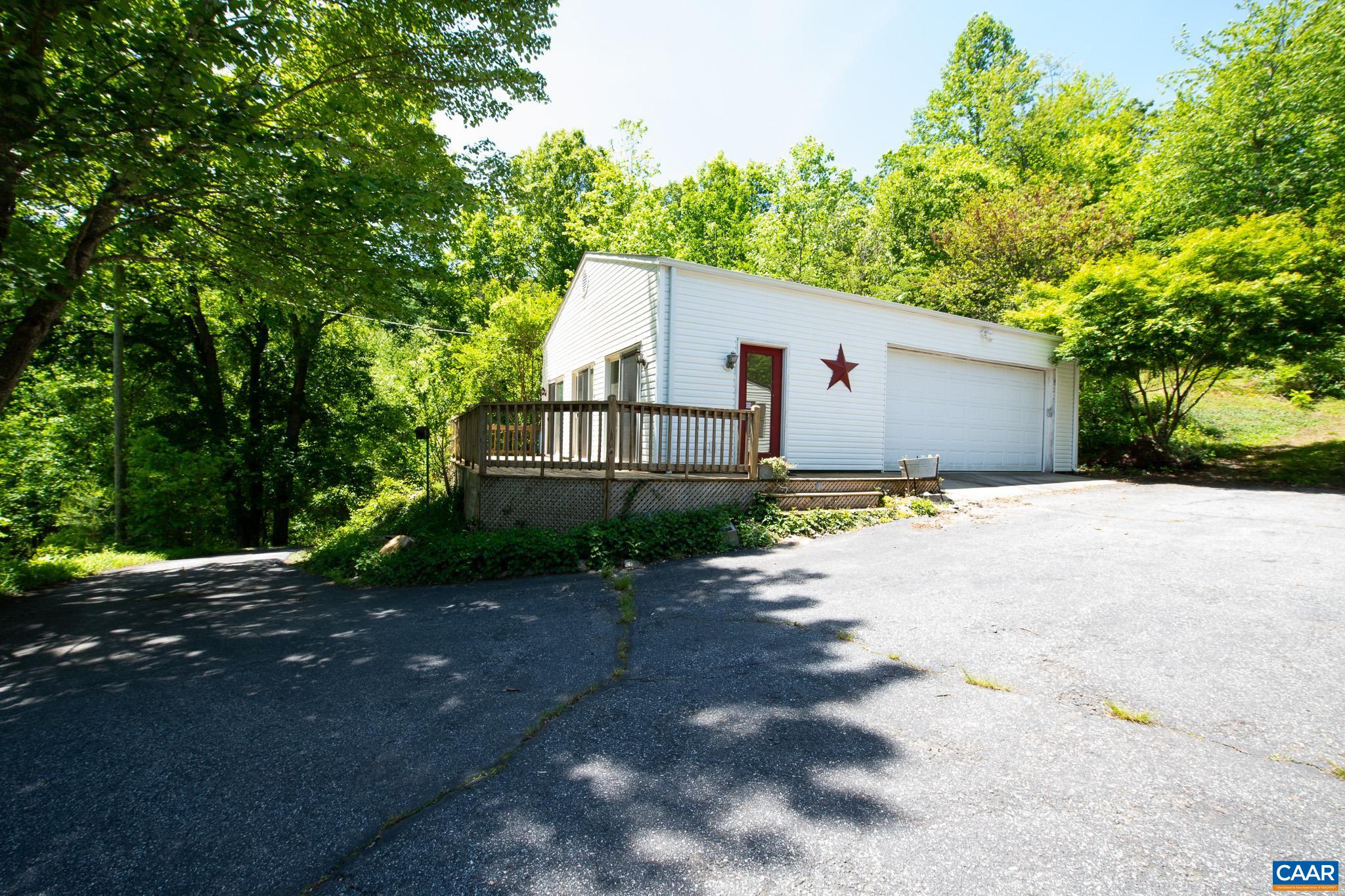 3033 Bacon Hollow Road Dyke, VA 22935 - Photo 30 of 66 a view of a back yard of the house