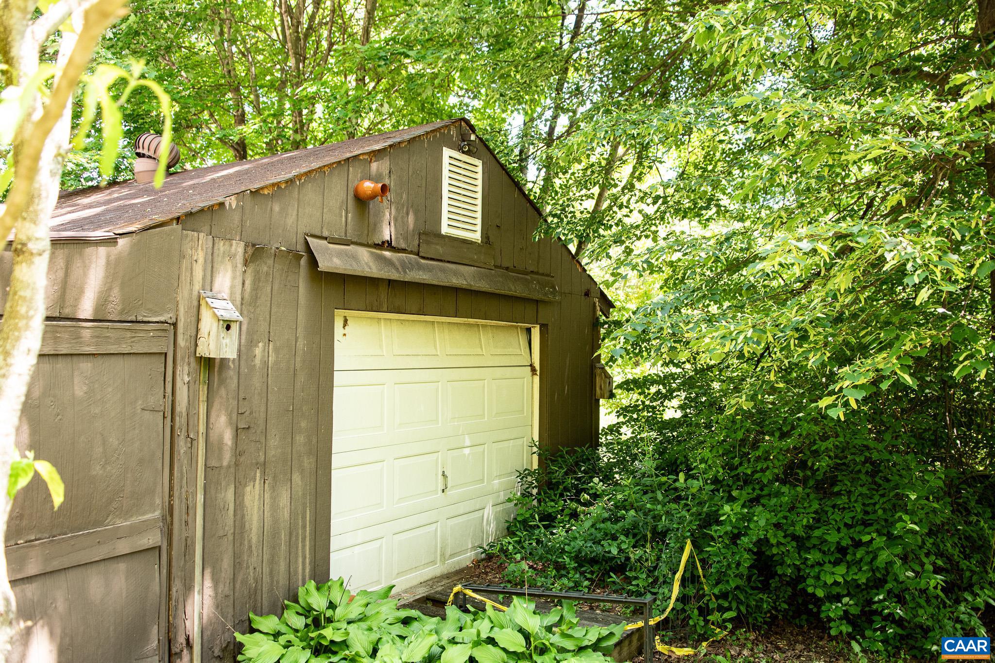 3033 Bacon Hollow Road Dyke, VA 22935 - Photo 39 of 66 a front view of a house with a tree