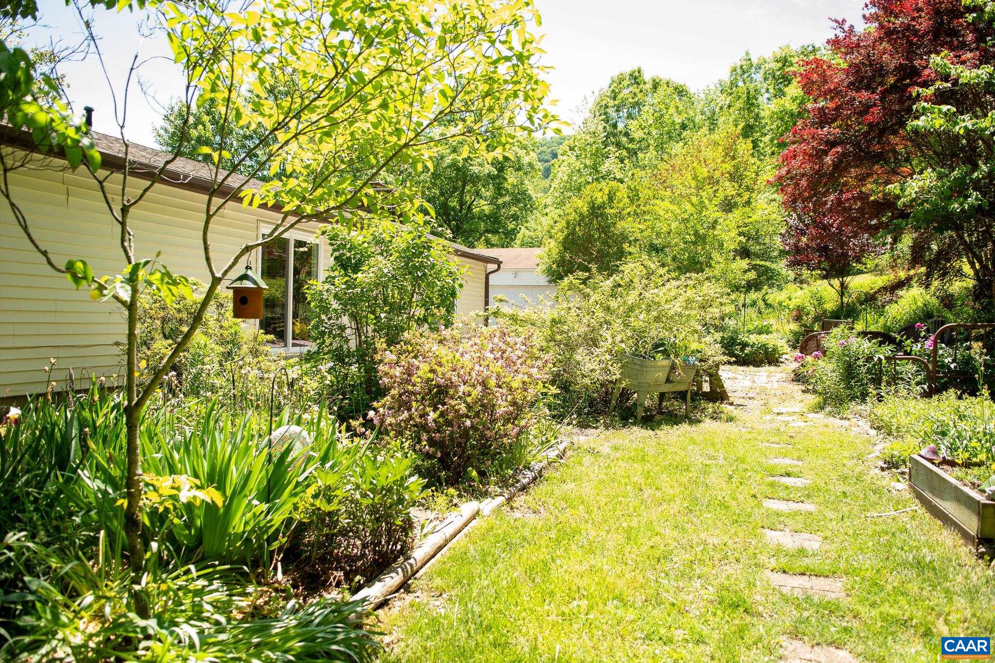 3033 Bacon Hollow Road Dyke, VA 22935 - Photo 57 of 66 a view of swimming pool with a garden