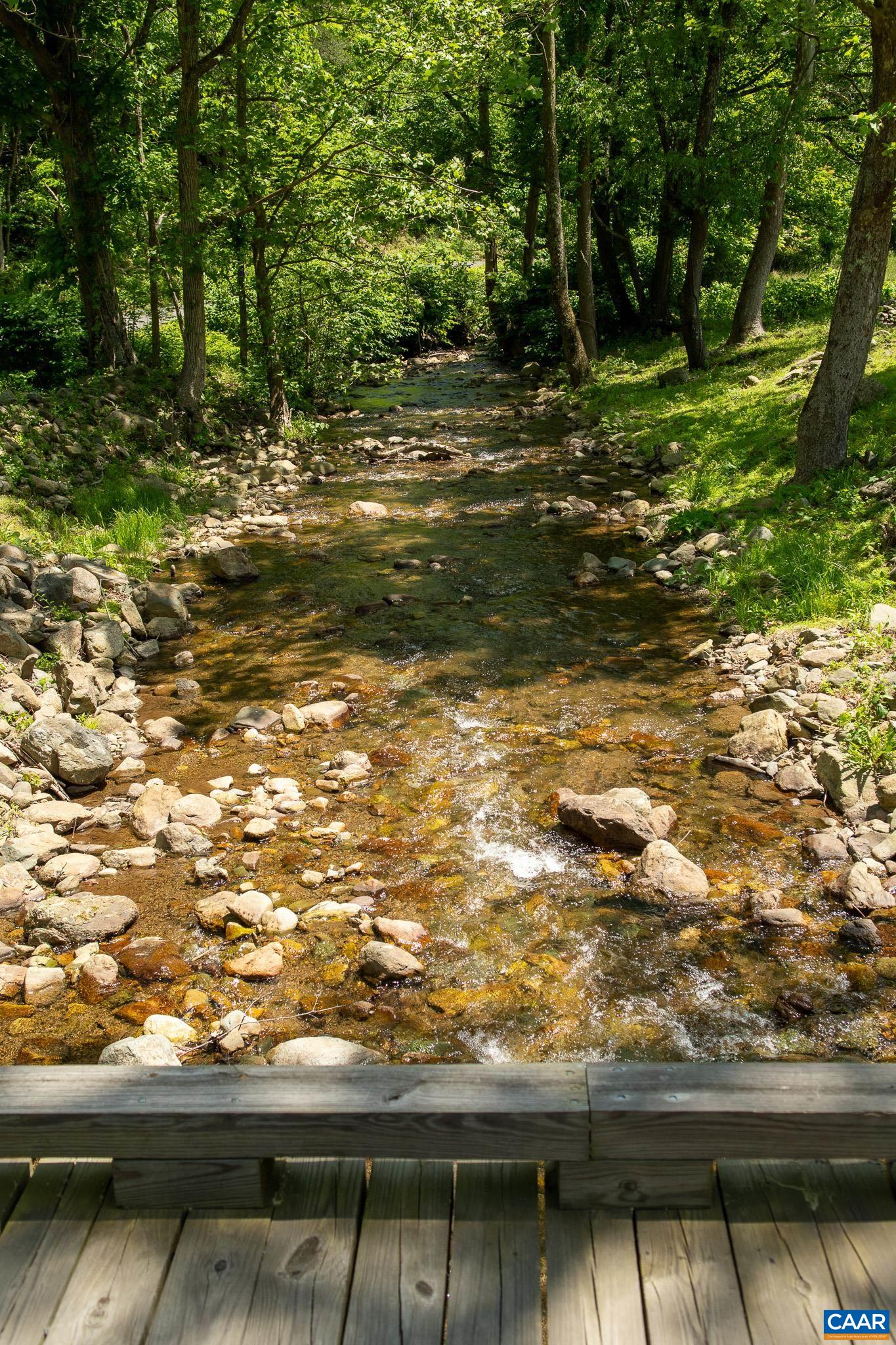 3033 Bacon Hollow Road Dyke, VA 22935 - Photo 59 of 66 a view of a yard with wooden fence