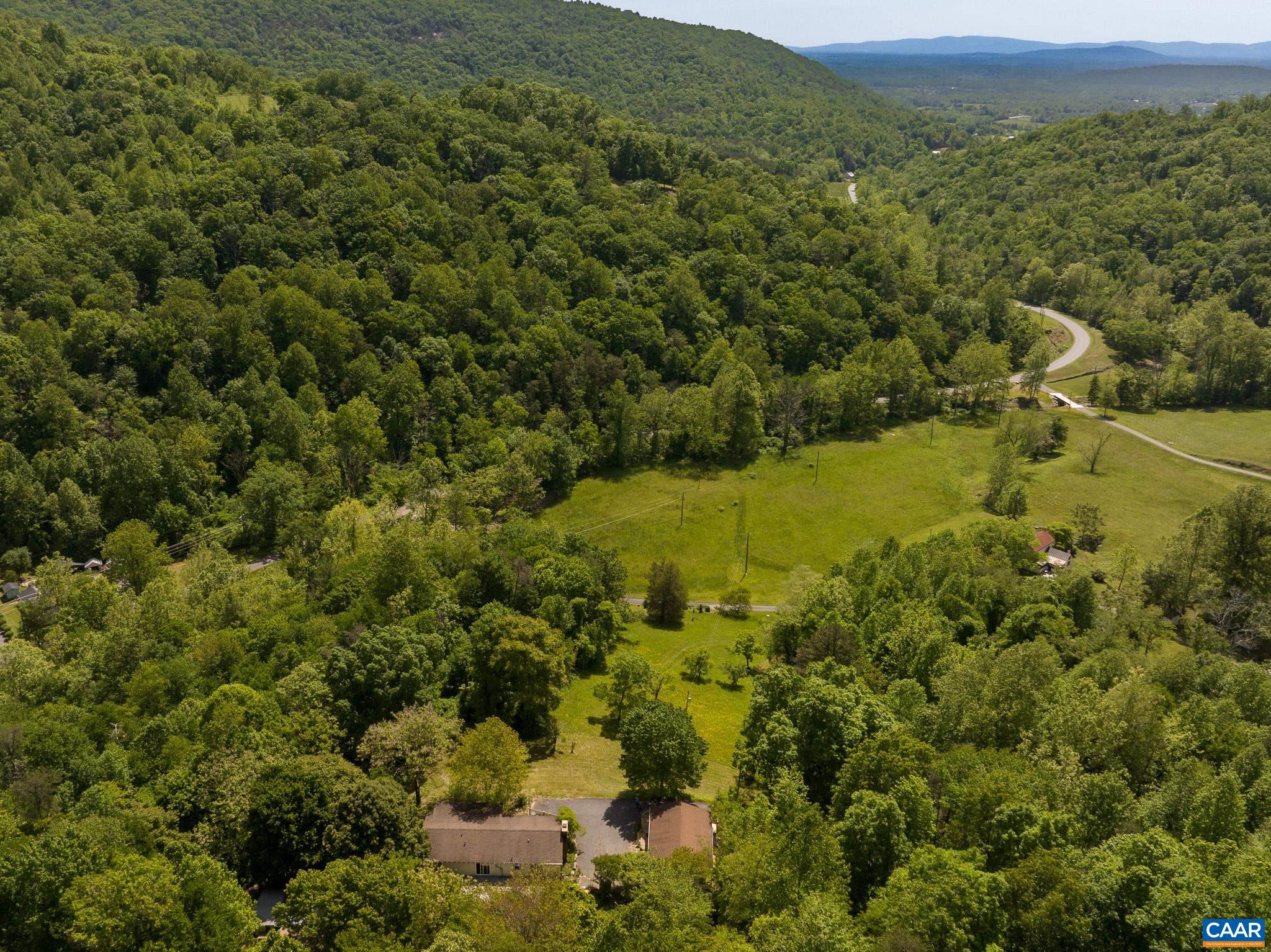 3033 Bacon Hollow Road Dyke, VA 22935 - Photo 61 of 66 an aerial view of residential houses with outdoor space and trees