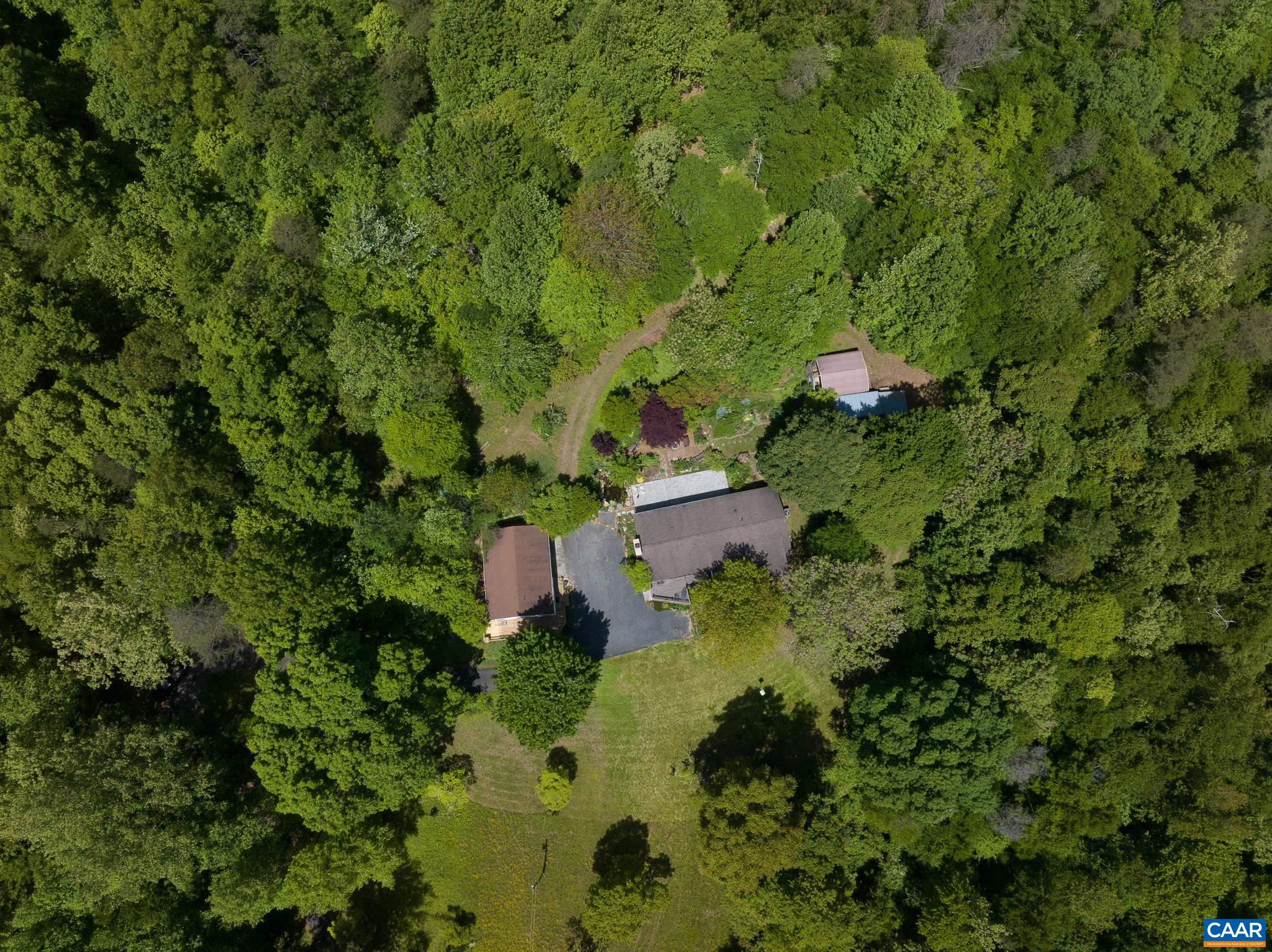 3033 Bacon Hollow Road Dyke, VA 22935 - Photo 64 of 66 an aerial view of residential house with outdoor space and trees all around