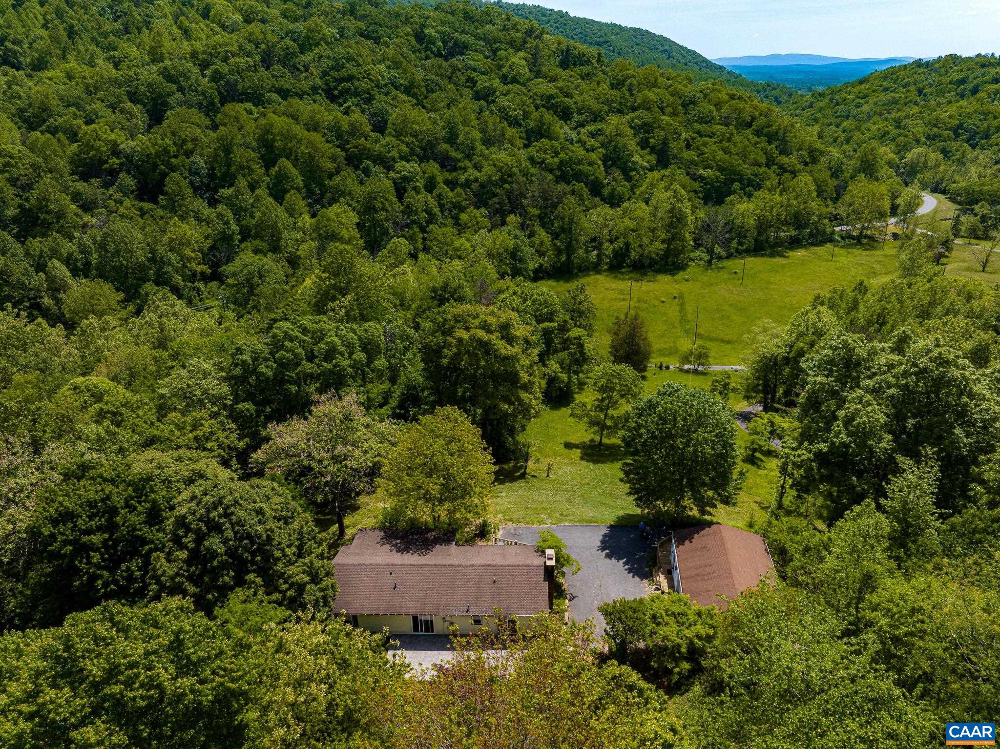 3033 Bacon Hollow Road Dyke, VA 22935 - Photo 66 of 66 an aerial view of a house with a yard
