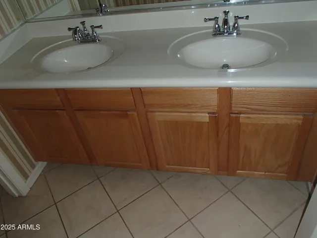 a bathroom with a toilet and a bath tub