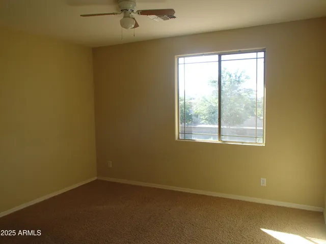 a bathroom with a sink and vanity