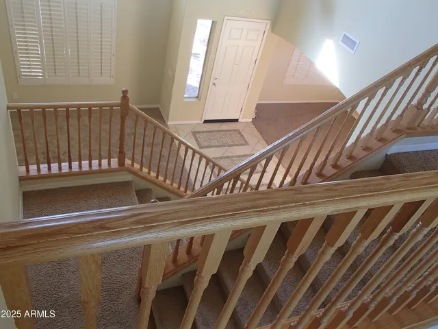 a view of a hallway with windows