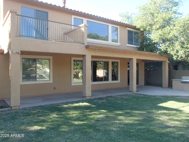 a view of a swimming pool with an outdoor seating