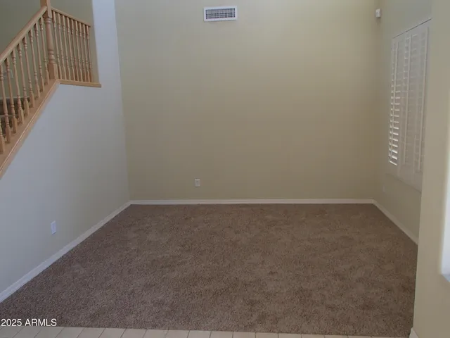 a view of a room with an empty space