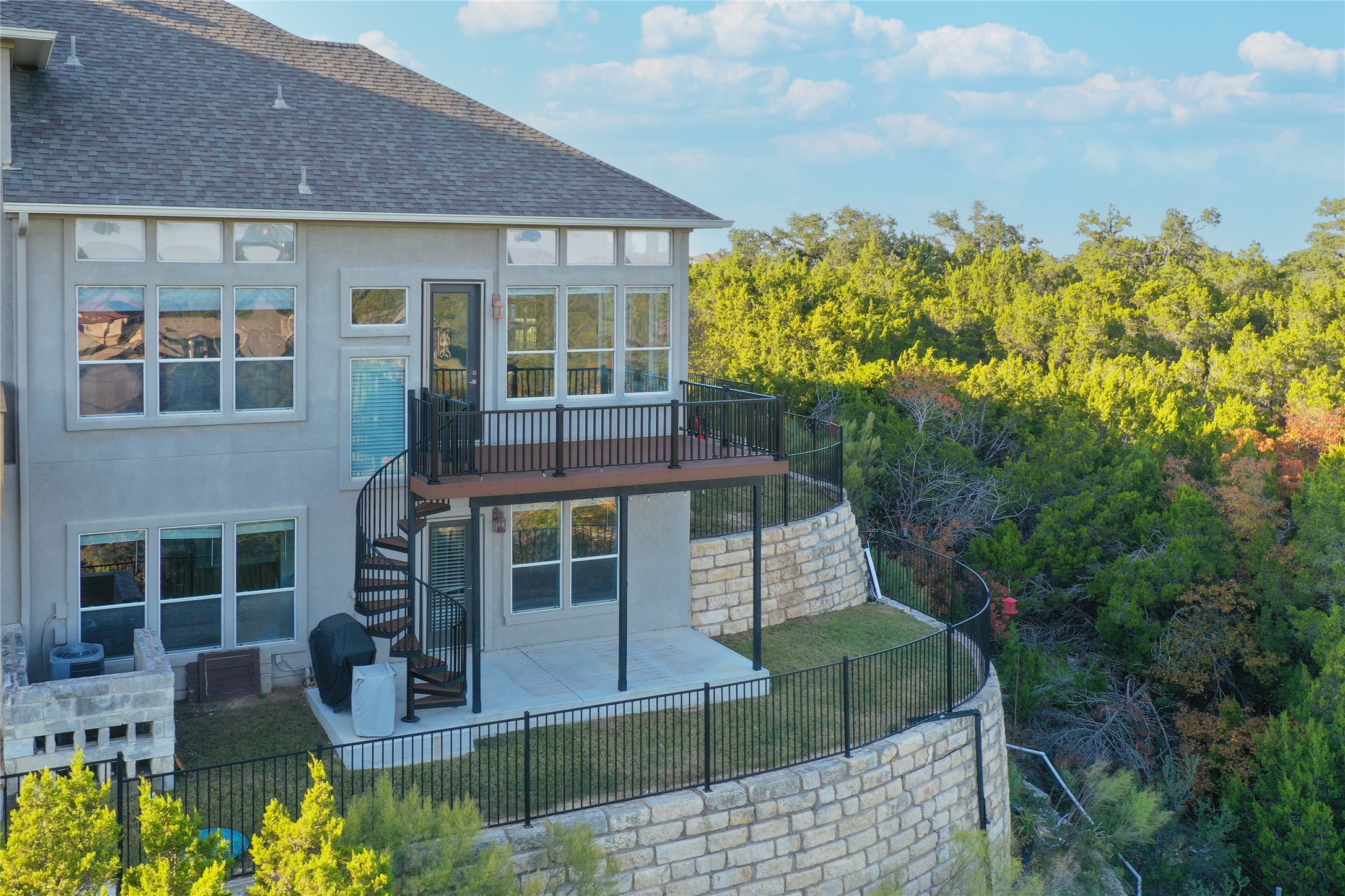 232 Sunrise Ridge Loop Austin, TX 78738 - Photo 1 of 37 Rear exterior with multi-level outdoor spaces
