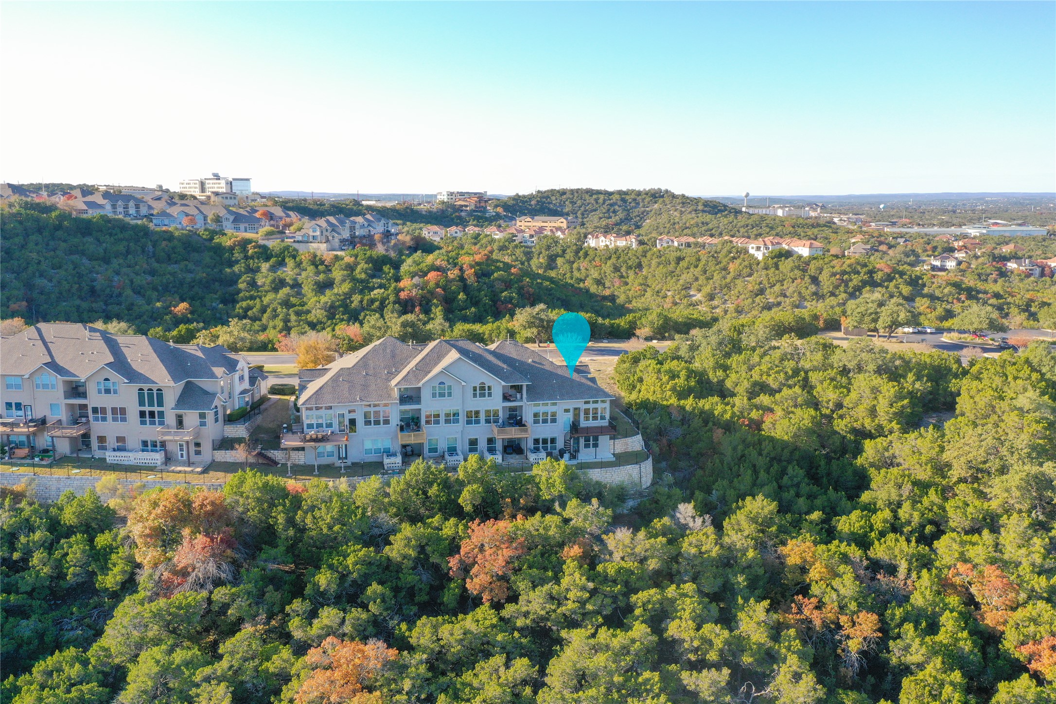 232 Sunrise Ridge Loop Austin, TX 78738 - Photo 2 of 37 Multi-level residence featuring a light-colored exterior and multiple private balconies