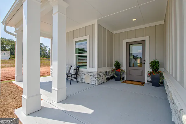 a view of livingroom with furniture and windows
