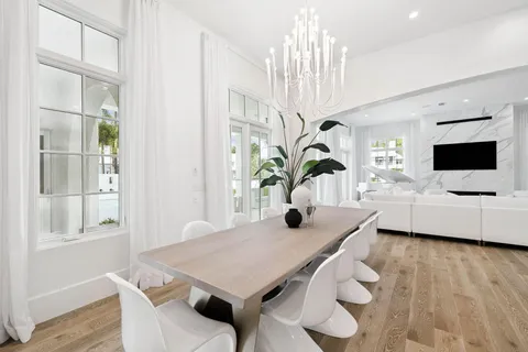 a bedroom with a bed and a mirror