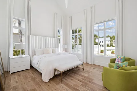 a bathroom with a bathtub and window