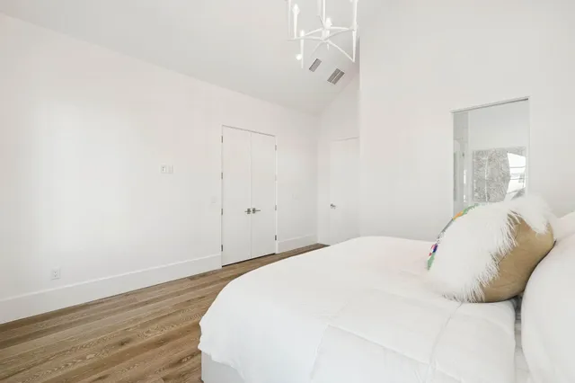 a view of swimming pool with a lounge chairs