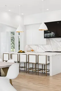 a living room with fireplace furniture and a flat screen tv