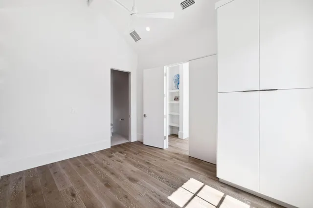 a view of a house with swimming pool and sitting area