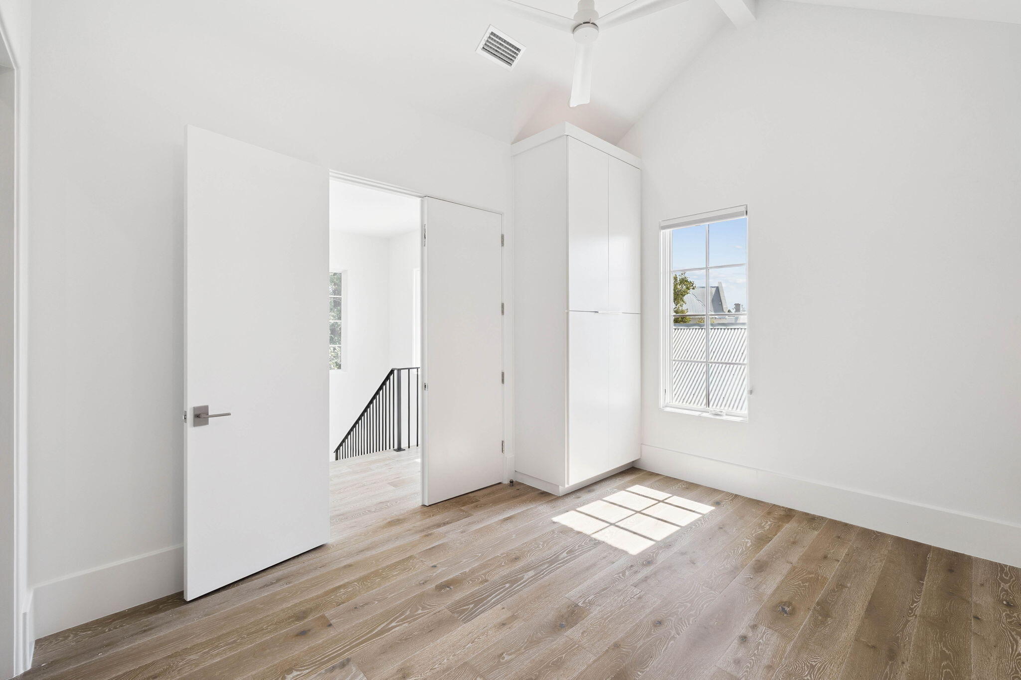 68 Perrin Santa Rosa Beach, FL 32459 - Photo 43 of 105 an empty room with wooden floor and windows