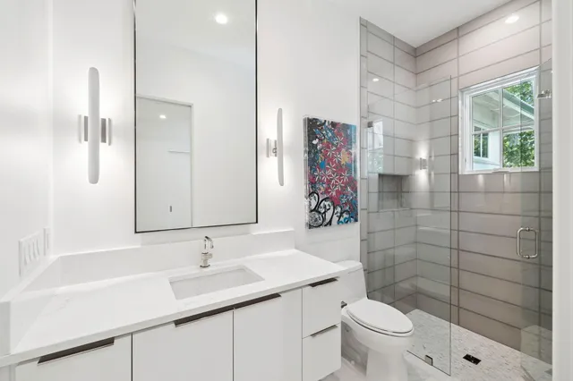 a view of a house with swimming pool and sitting area