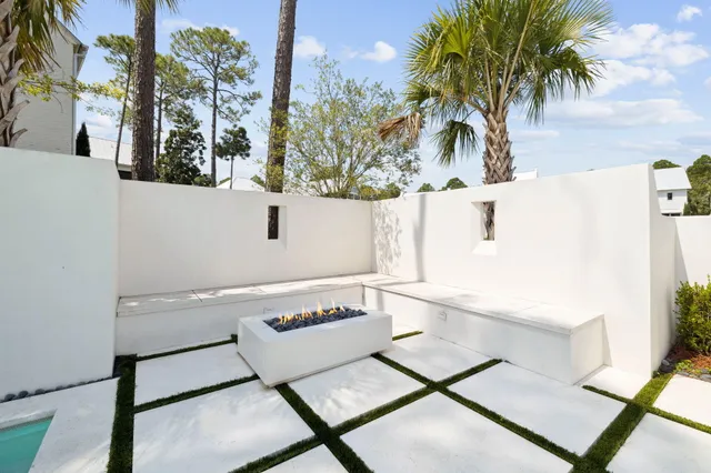 a view of a terrace with sitting area