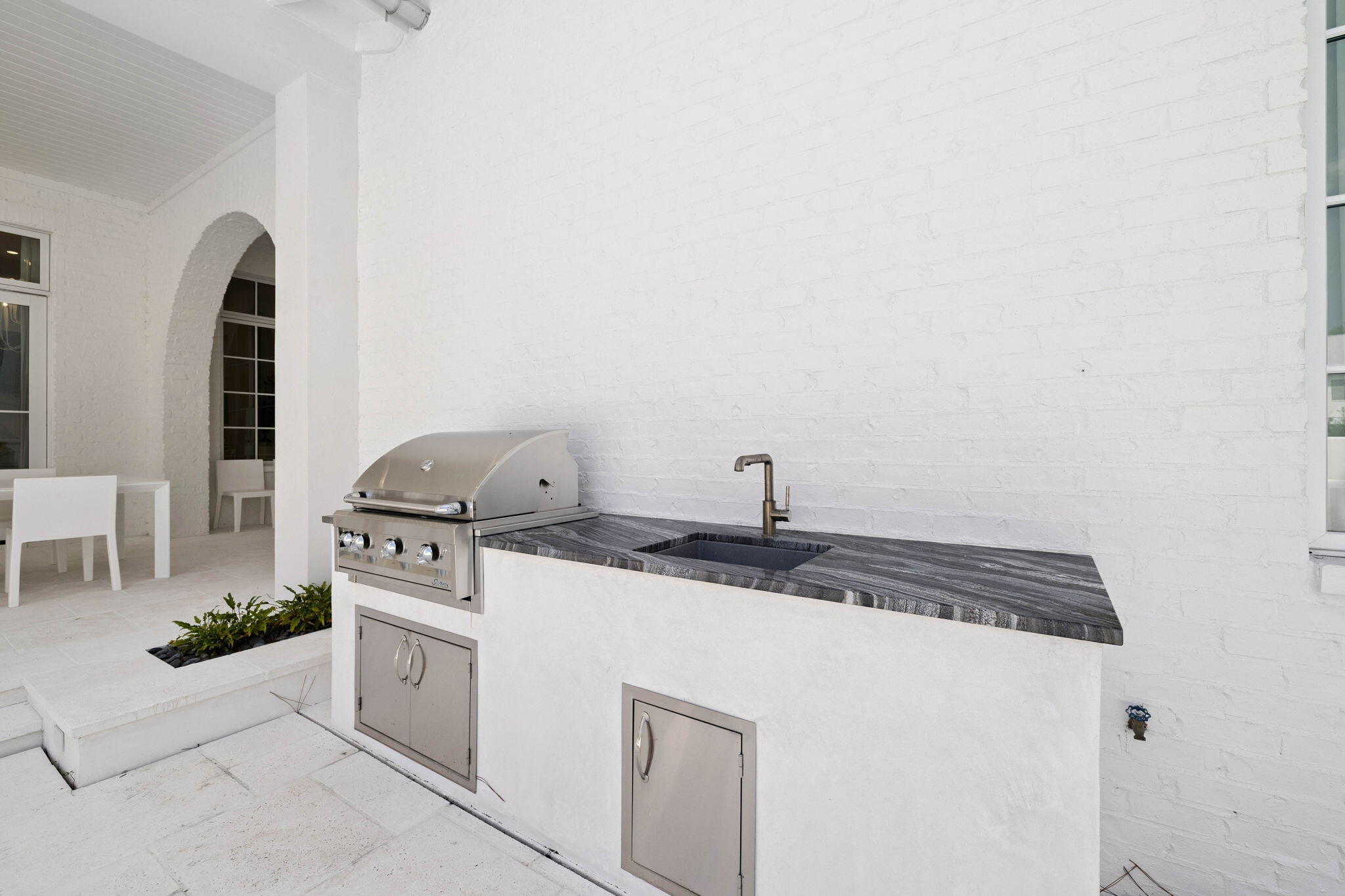 68 Perrin Santa Rosa Beach, FL 32459 - Photo 60 of 105 a kitchen with granite countertop white cabinets and white appliances