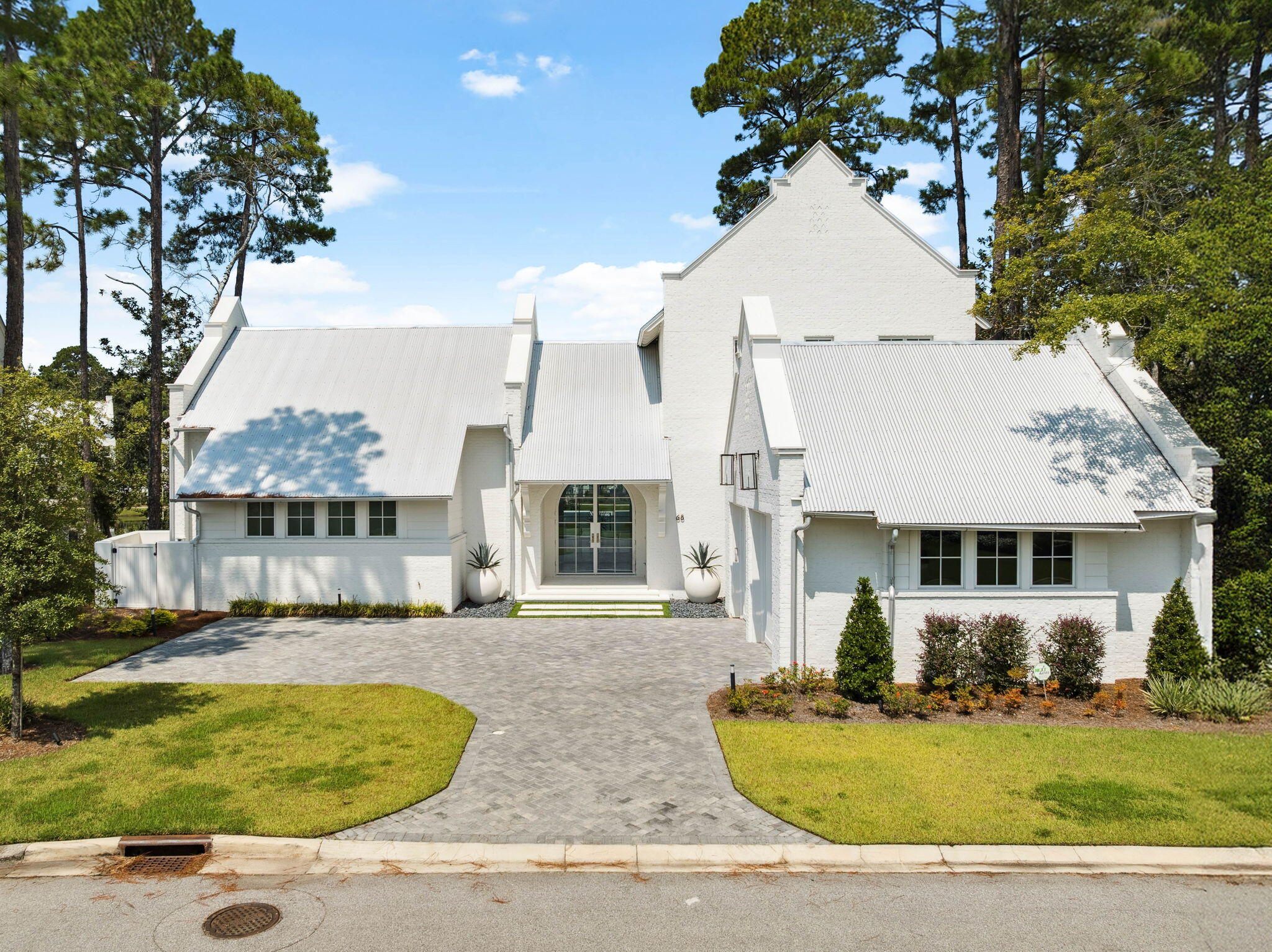 68 Perrin Santa Rosa Beach, FL 32459 - Photo 82 of 105 a view of a white house with a swimming pool and a yard