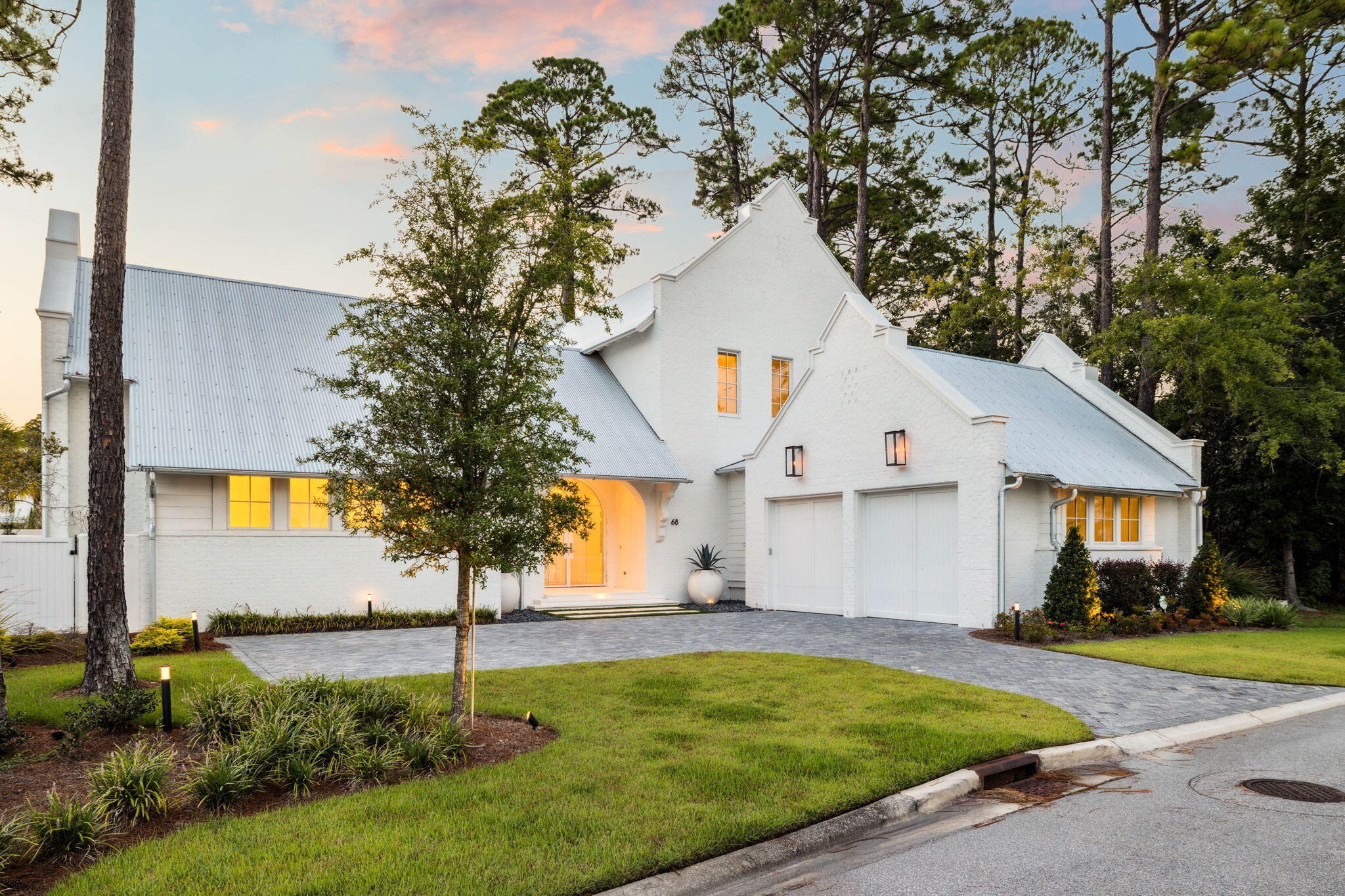 68 Perrin Santa Rosa Beach, FL 32459 - Photo 89 of 105 a view of a white house with a yard and plants