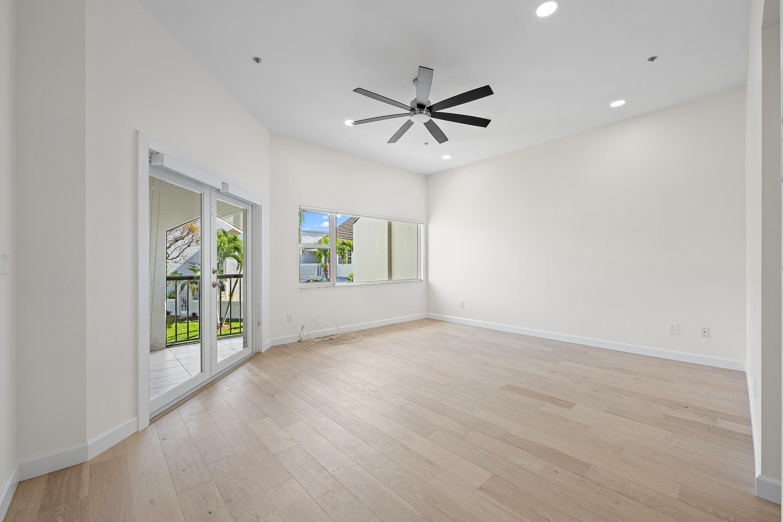 1000 North Us Highway, Unit 652 Jupiter, FL 33477 - Photo 30 of 64 an empty room with windows and fan