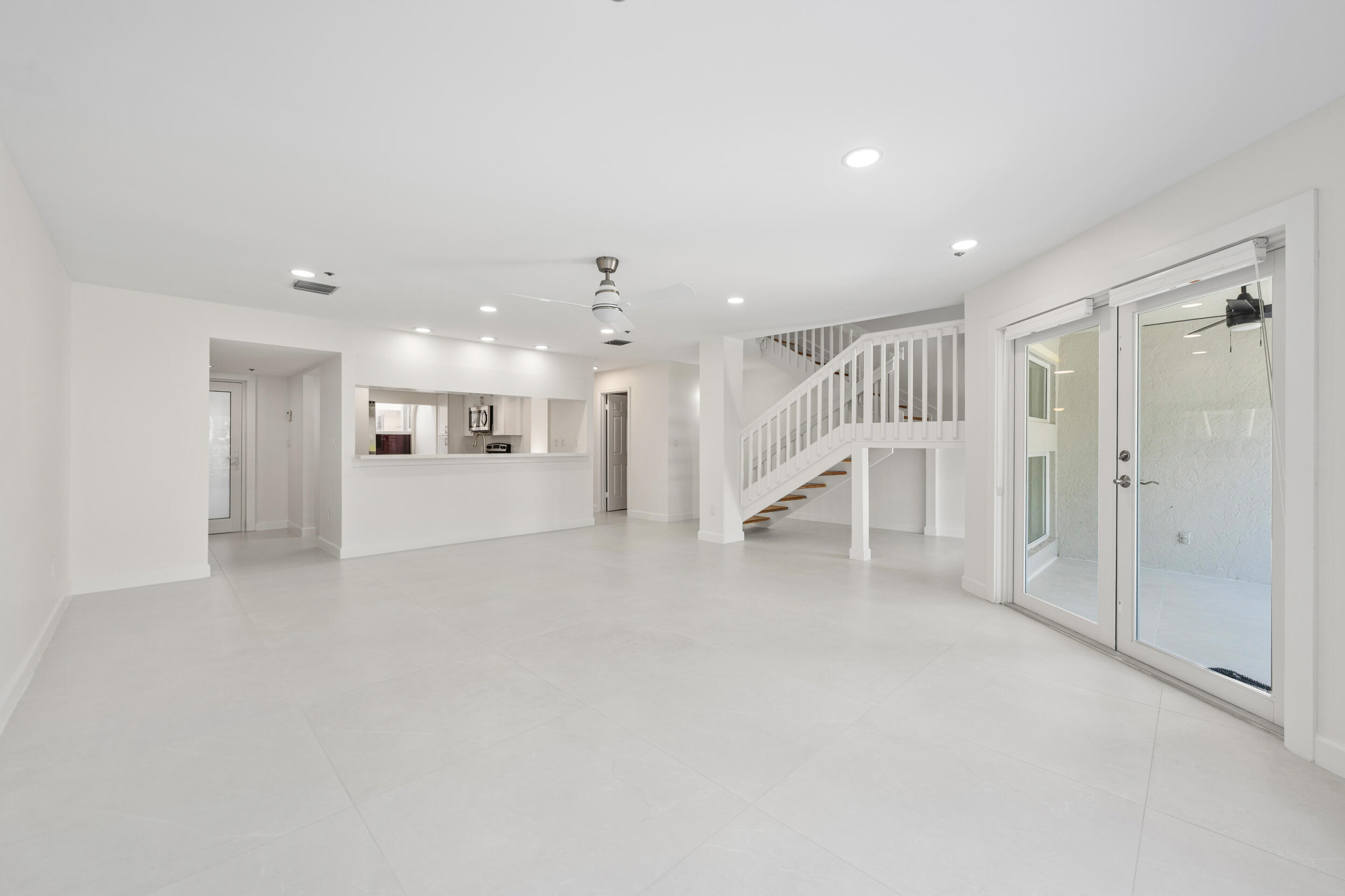 1000 North Us Highway, Unit 652 Jupiter, FL 33477 - Photo 32 of 64 a view of an empty room with kitchen and entryway