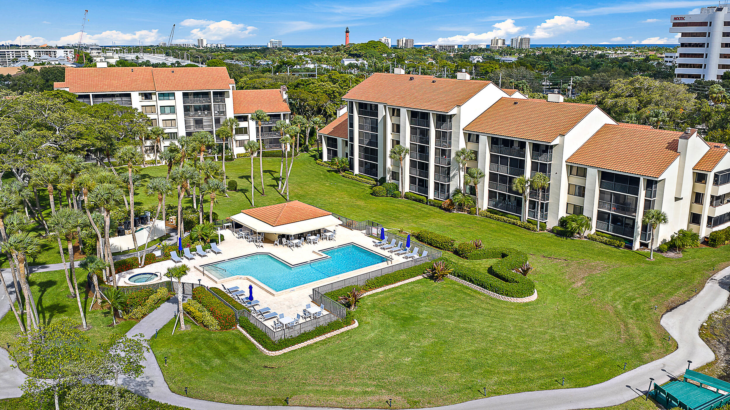 1000 North Us Highway, Unit 652 Jupiter, FL 33477 - Photo 47 of 64 an aerial view of a house with yard swimming pool and outdoor seating