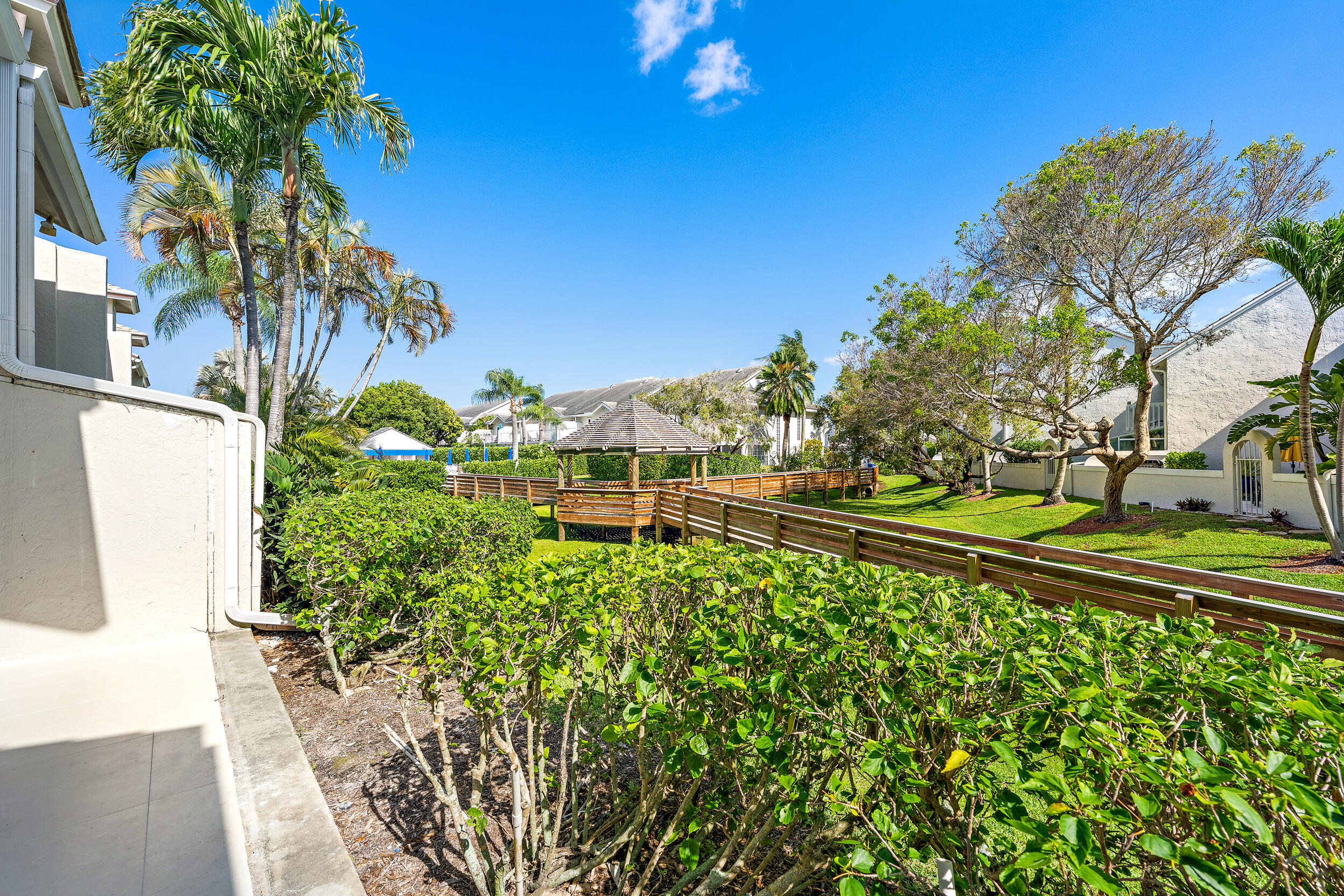 1000 North Us Highway, Unit 652 Jupiter, FL 33477 - Photo 55 of 64 a view of a yard with flower plants