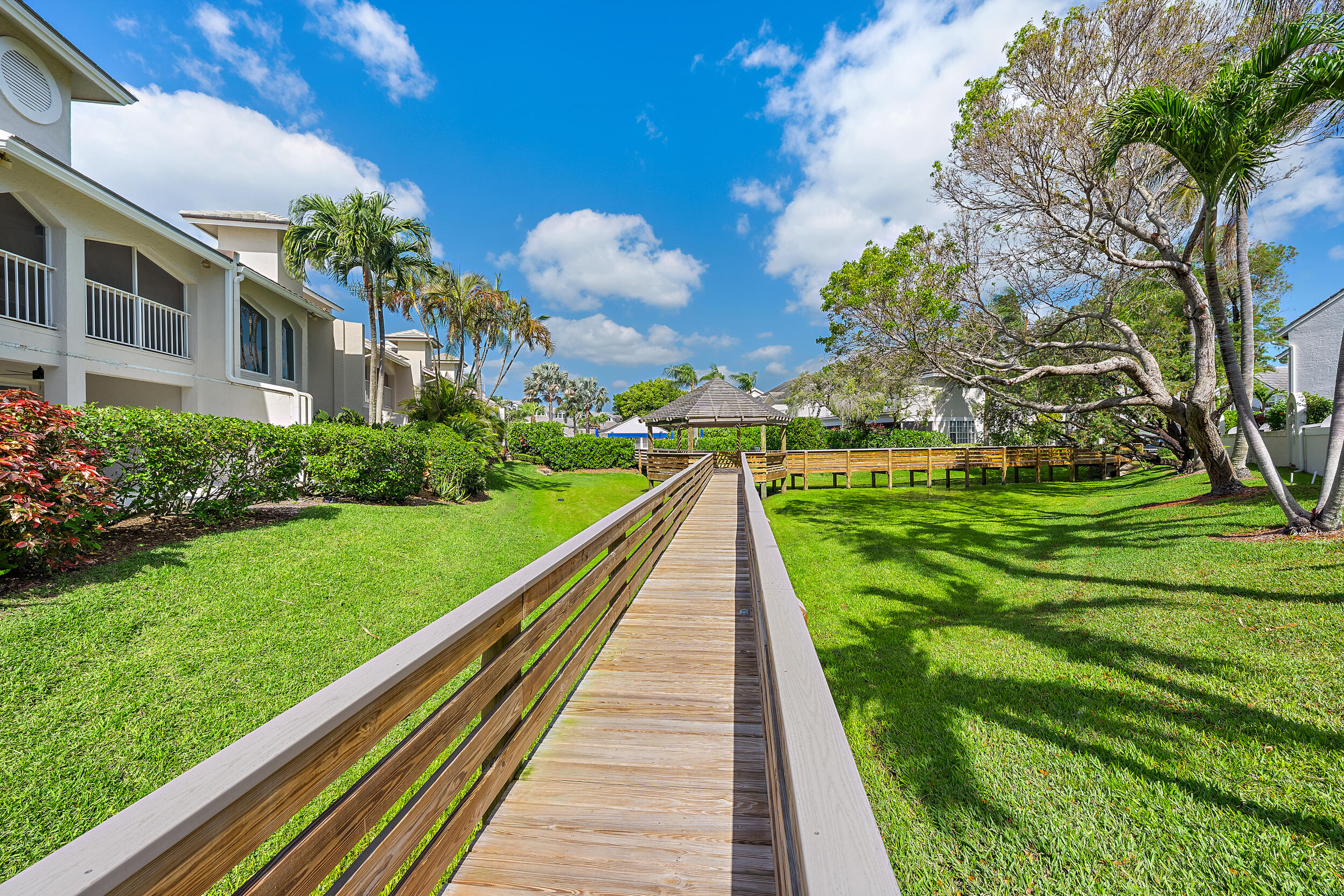 1000 North Us Highway, Unit 652 Jupiter, FL 33477 - Photo 56 of 64 a view of a house with a yard