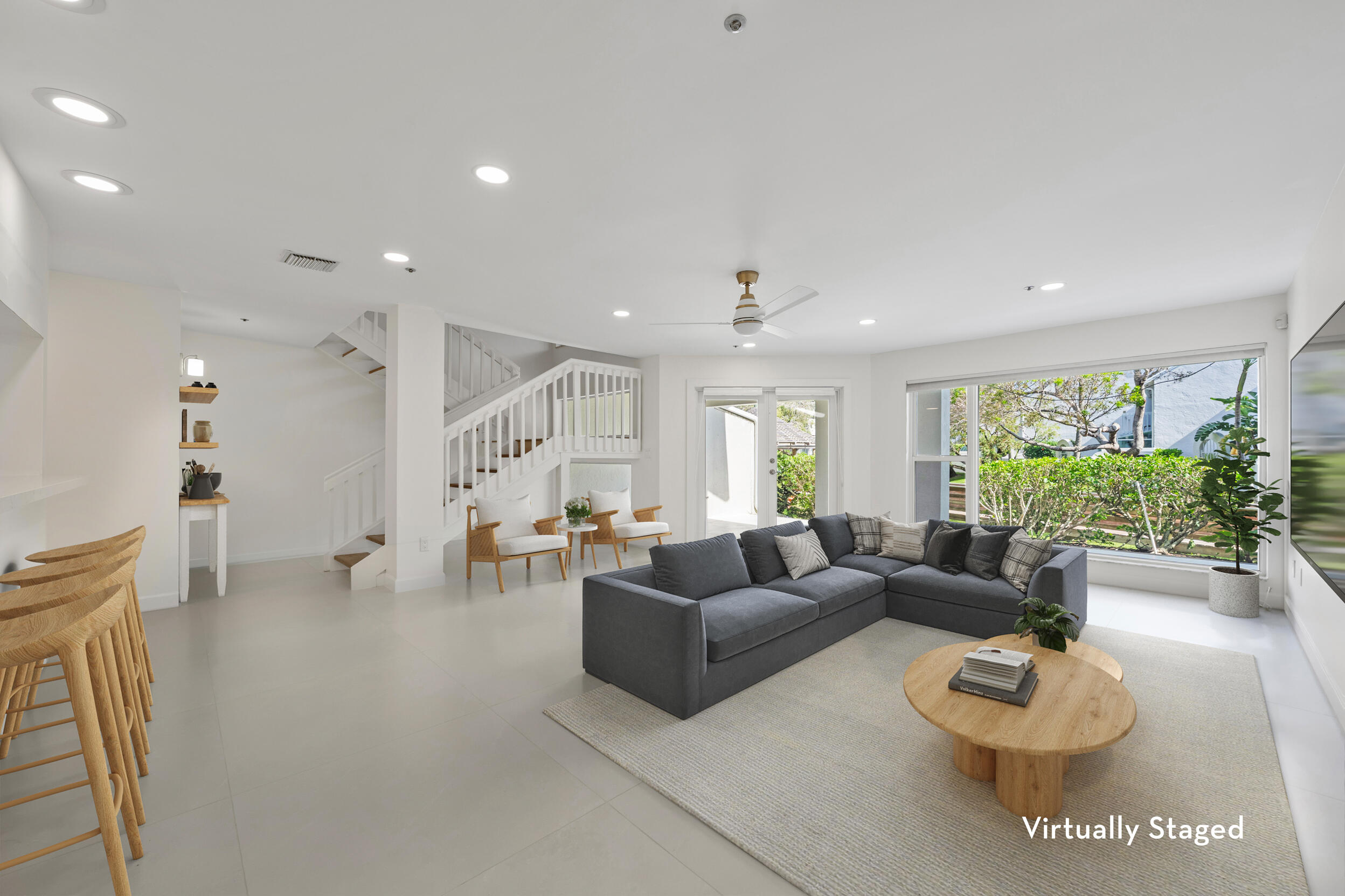 1000 North Us Highway, Unit 652 Jupiter, FL 33477 - Photo 7 of 64 a living room with furniture and a large window