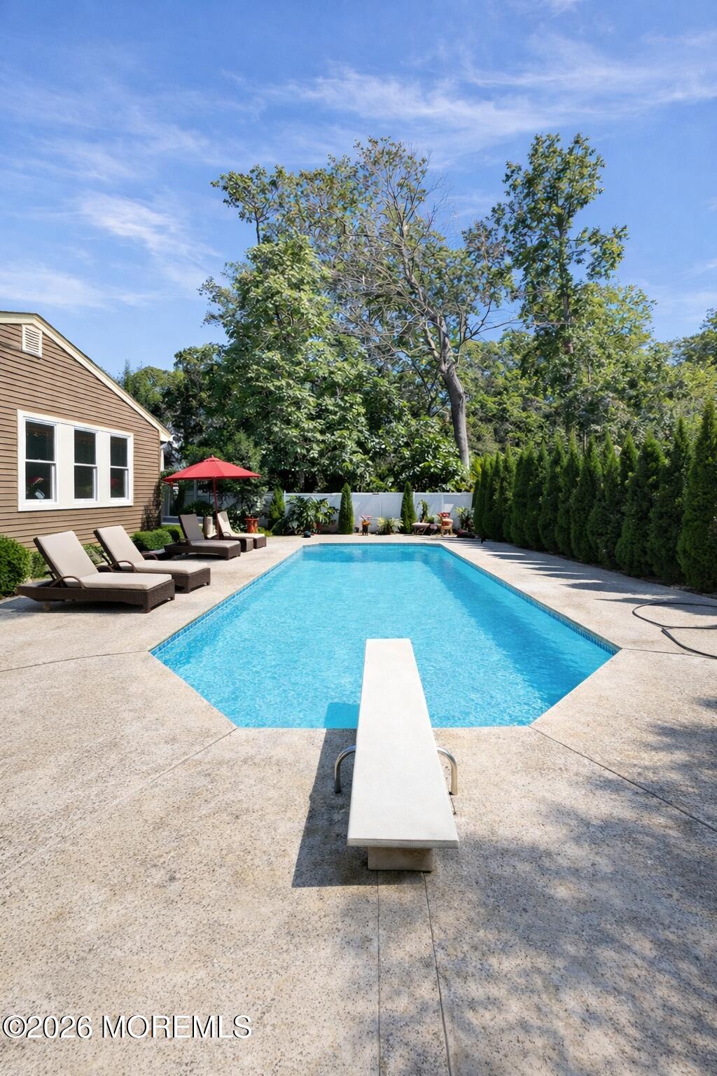 a view of outdoor space yard and swimming pool