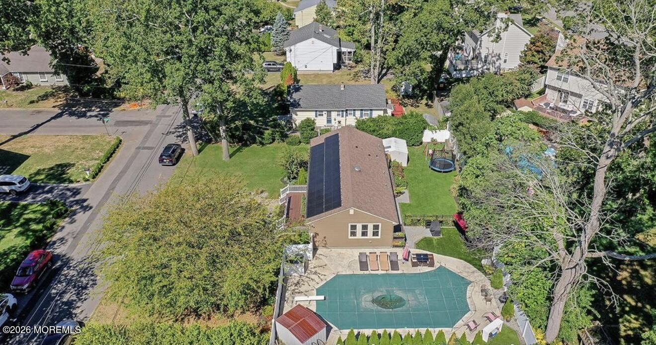 175 Delaware Avenue Oakhurst, NJ 07755 - Photo 2 of 24 an aerial view of a house with a yard and garden