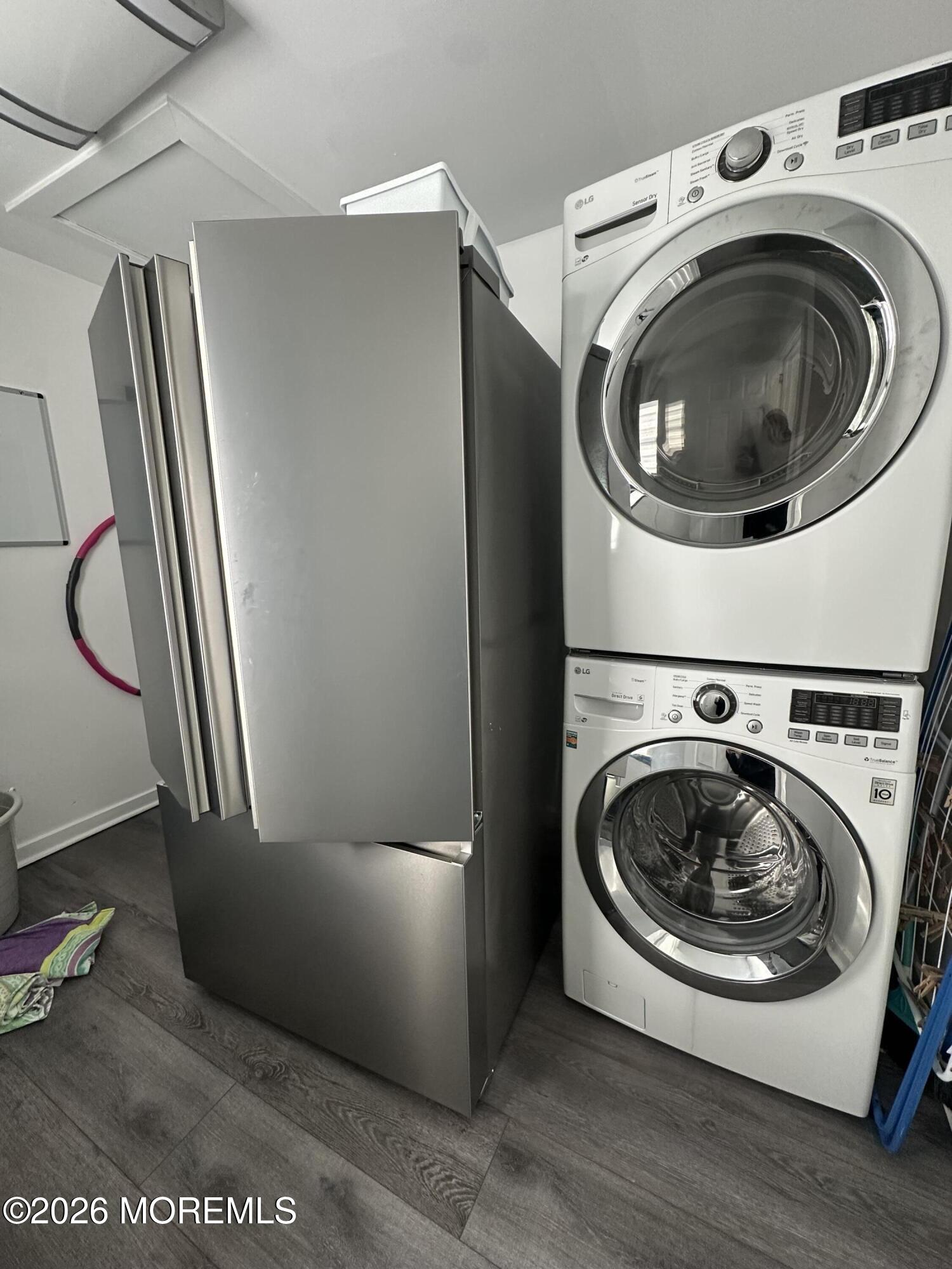 175 Delaware Avenue Oakhurst, NJ 07755 - Photo 23 of 24 a utility room with dryer and washer