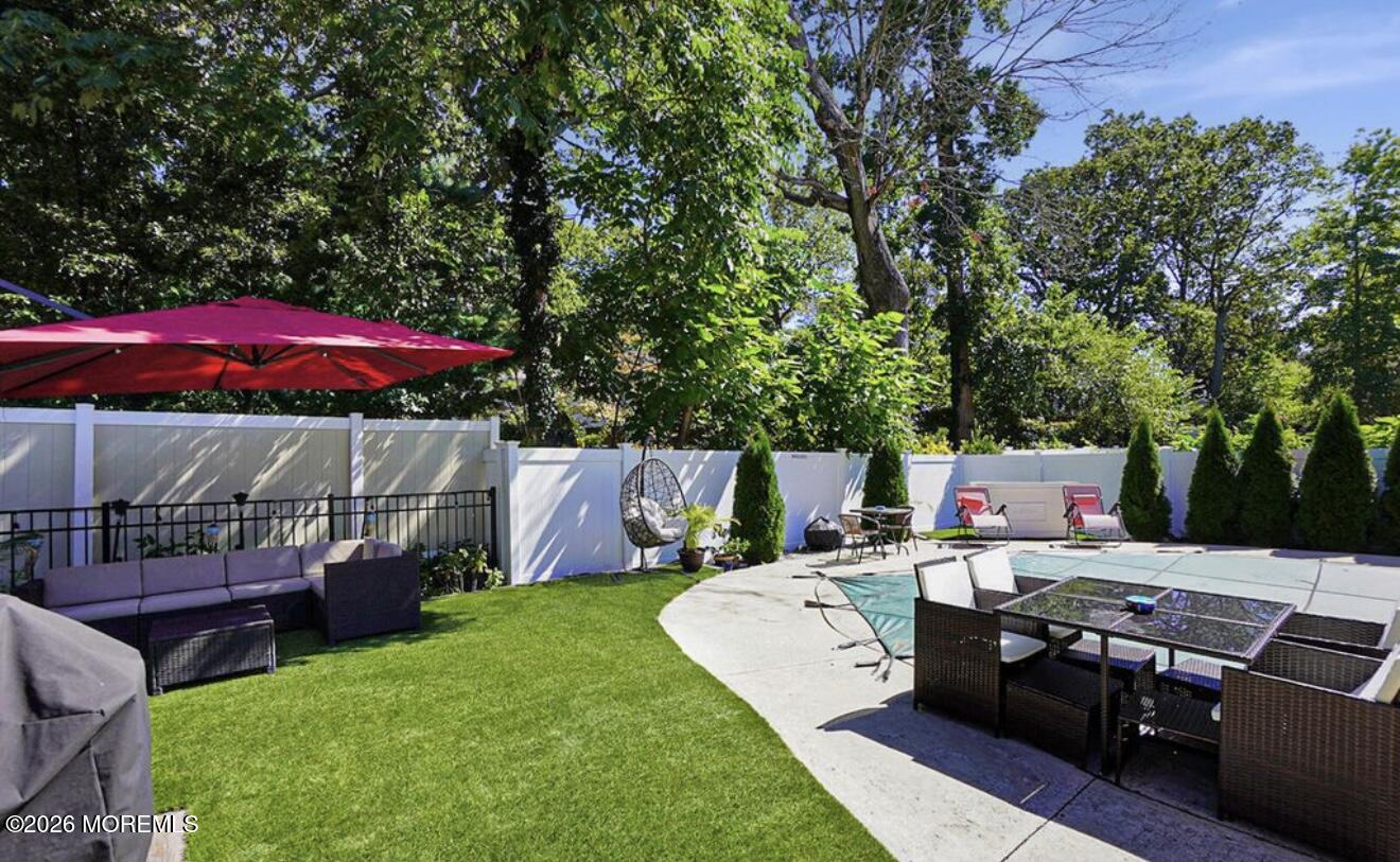 175 Delaware Avenue Oakhurst, NJ 07755 - Photo 4 of 24 an outdoor space with seating