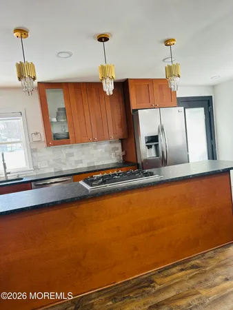 a picture of a room with wooden floor