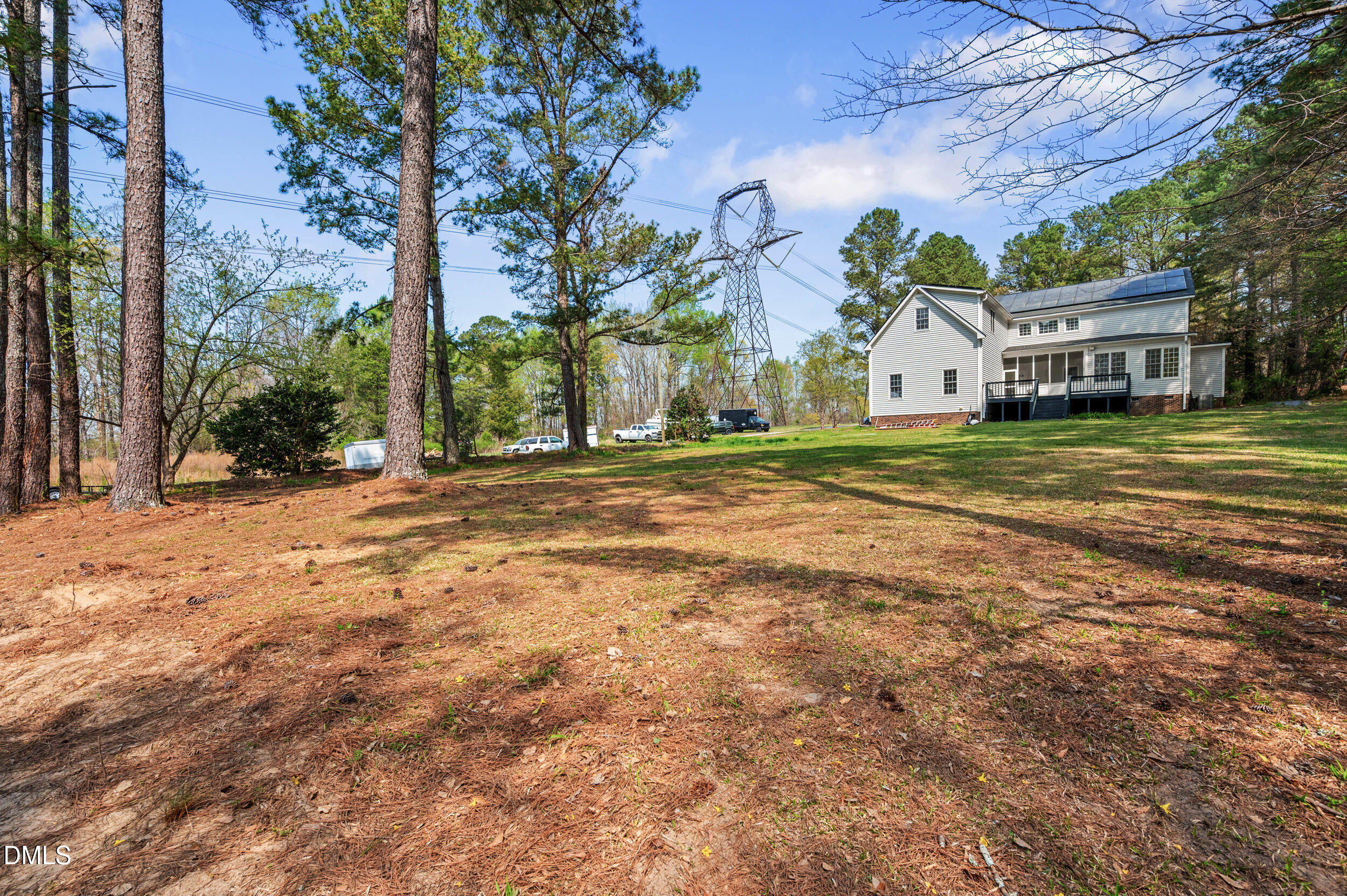 1957 Hilltop Road Raleigh, NC 27610 - Photo 38 of 46 a front view of a house with a yard and trees