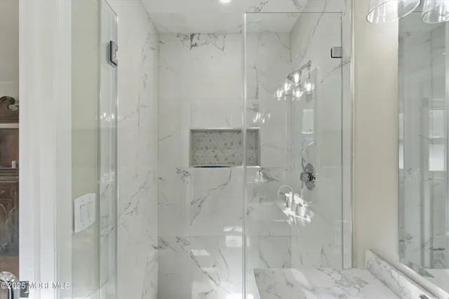 a bathroom with a window and a toilet