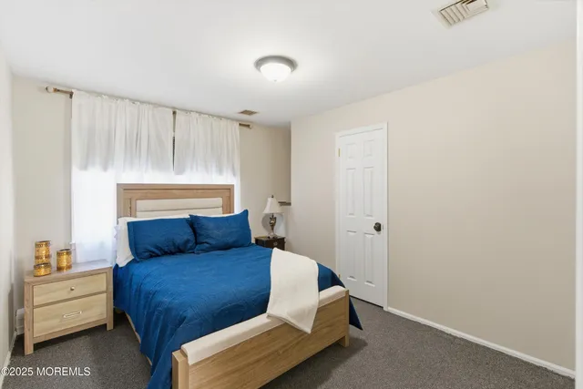 a swimming pool with chairs